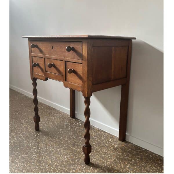 Oak side table with drawers and turned legs